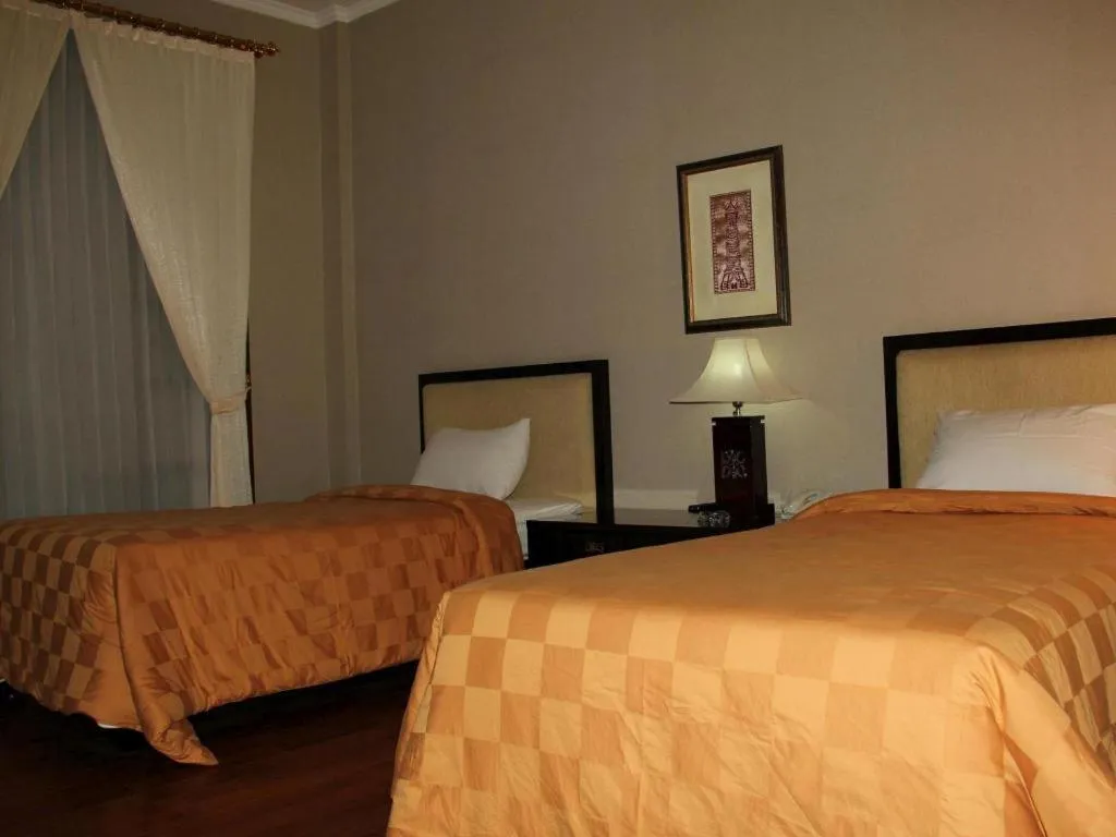 Bed in Campago Resort Hotel