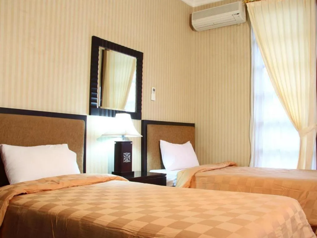 Bed in Campago Resort Hotel