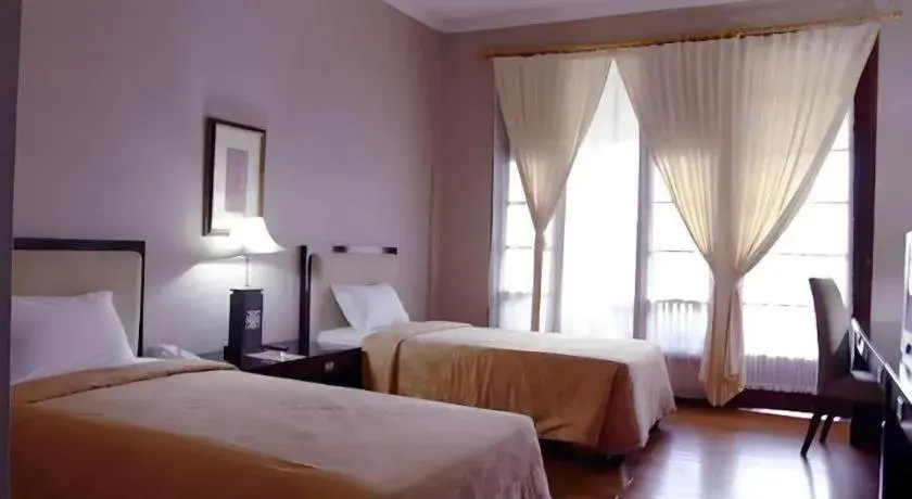 Bed in Campago Resort Hotel Bed in Campago Resort Hotel