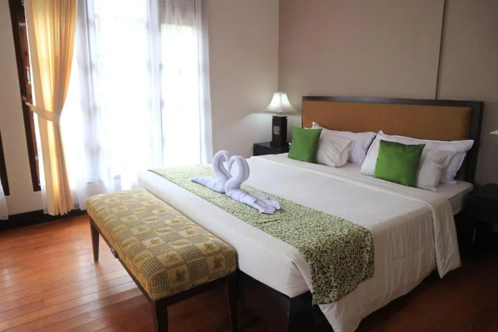 Bed in Campago Resort Hotel