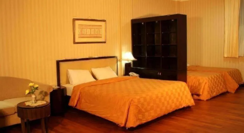 Bed in Campago Resort Hotel