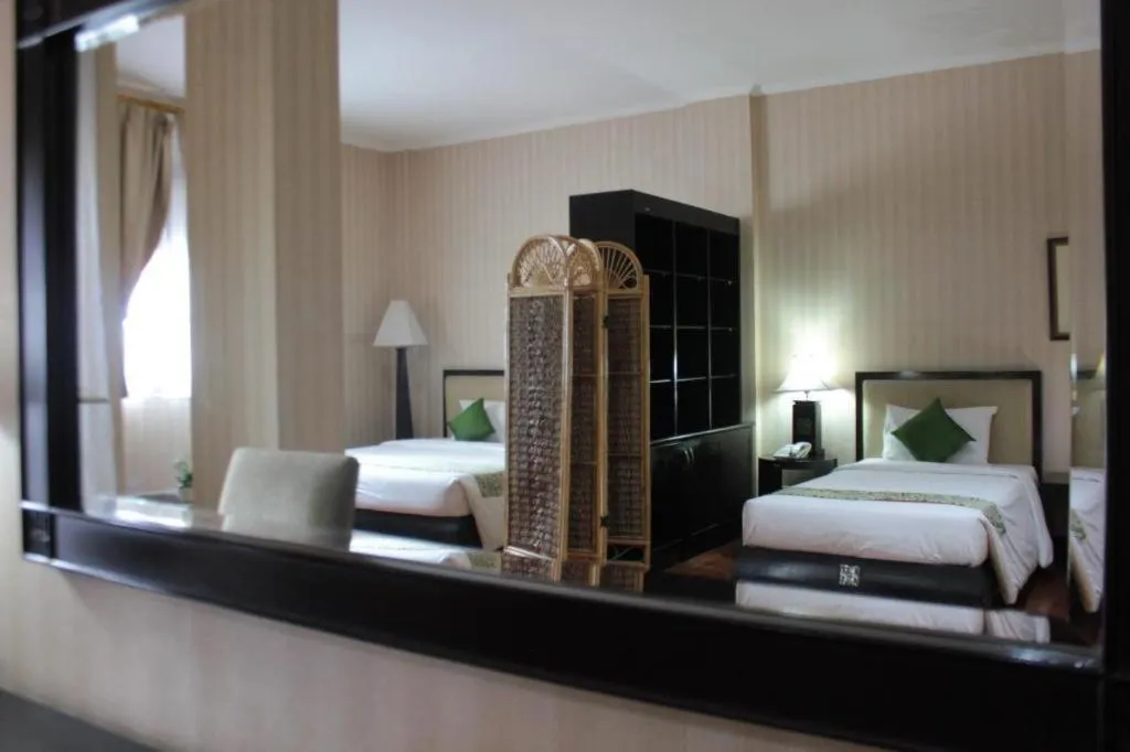 Bed in Campago Resort Hotel