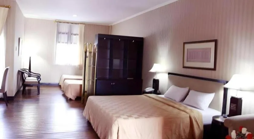 Bed in Campago Resort Hotel