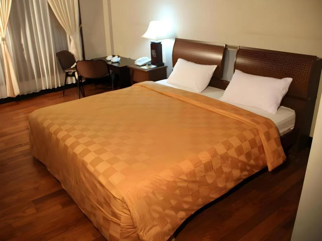 Bed in Campago Resort Hotel