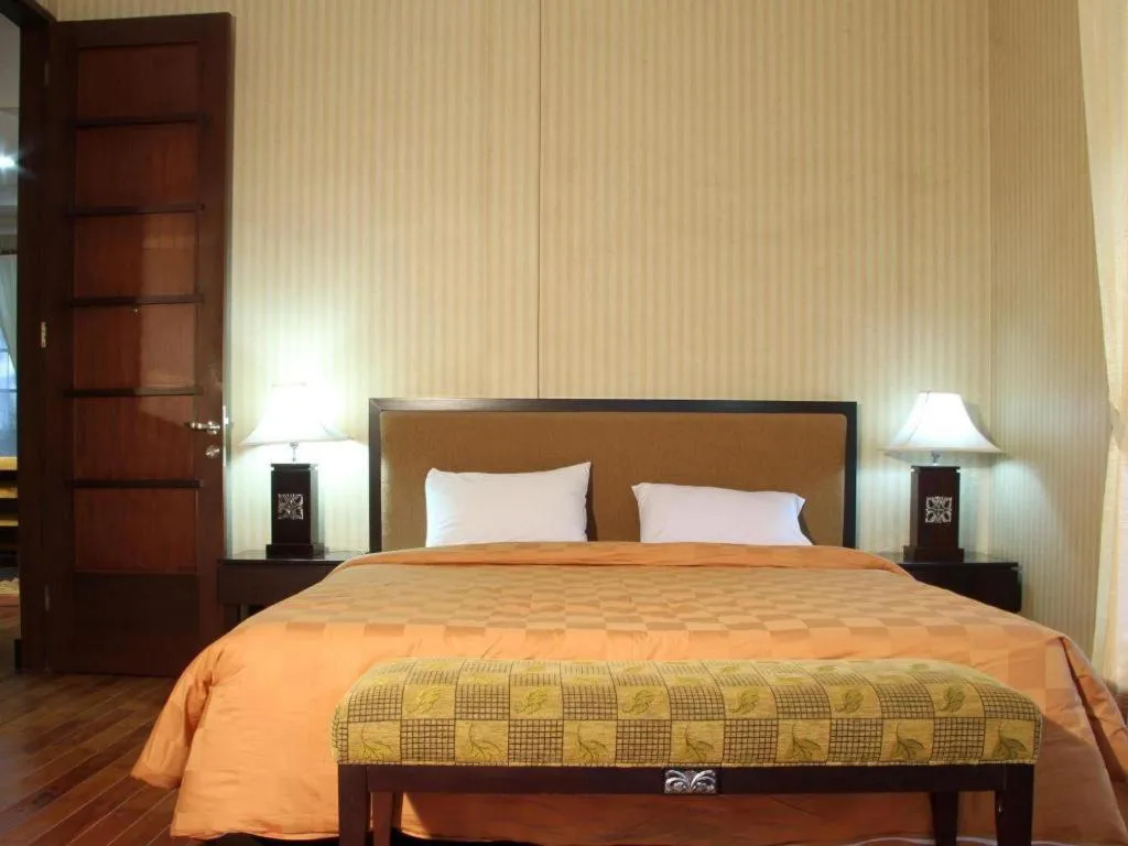 Bed in Campago Resort Hotel