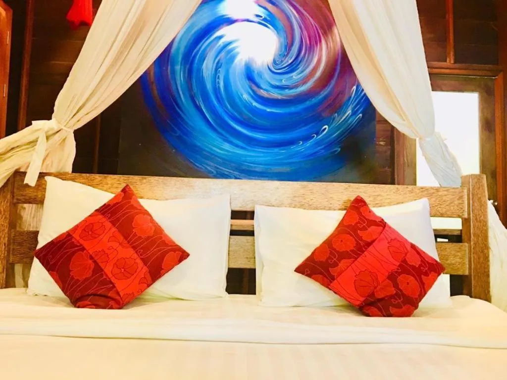 Bed in Chivaree Hotel and Resort