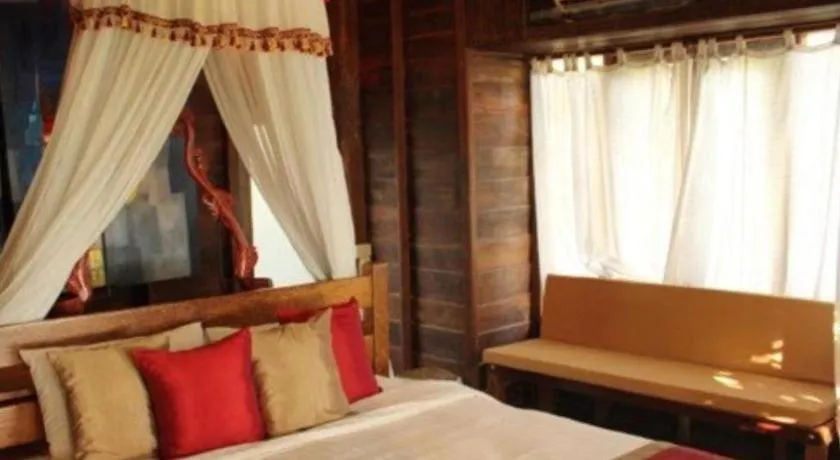Bed in Chivaree Hotel and Resort