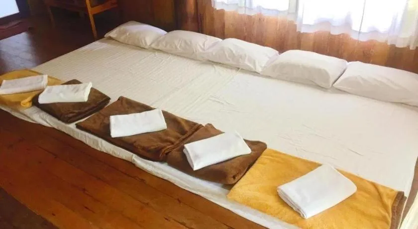 Bed in Chivaree Hotel and Resort