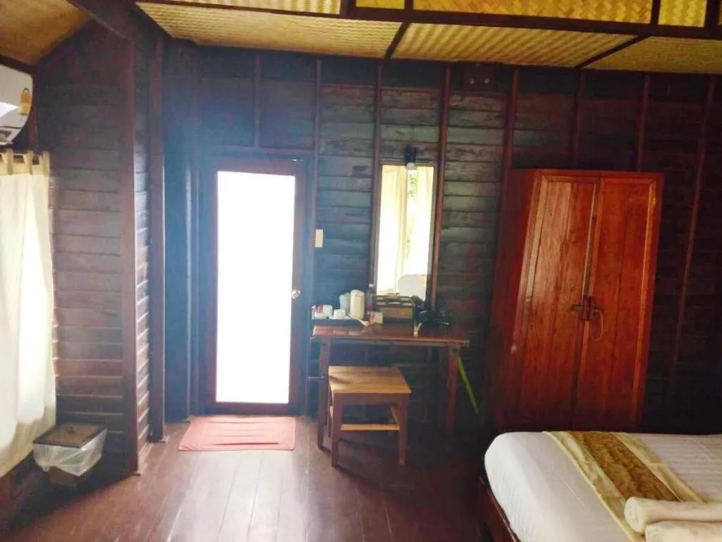 Bed in Chivaree Hotel and Resort