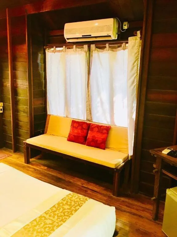 Bed in Chivaree Hotel and Resort