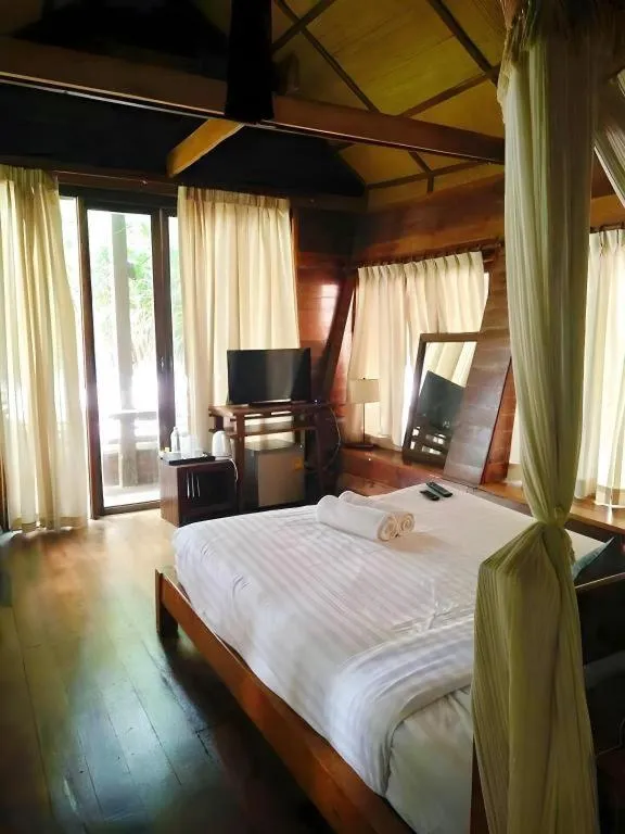 Bed in Chivaree Hotel and Resort