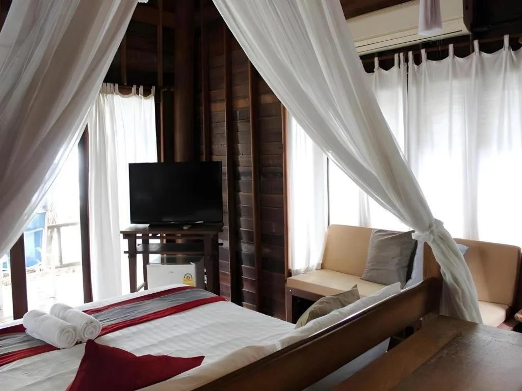 Bed in Chivaree Hotel and Resort