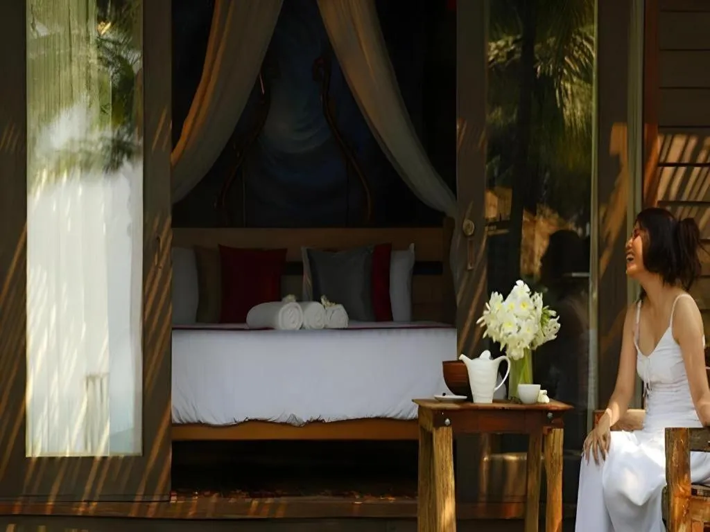 Bed in Chivaree Hotel and Resort