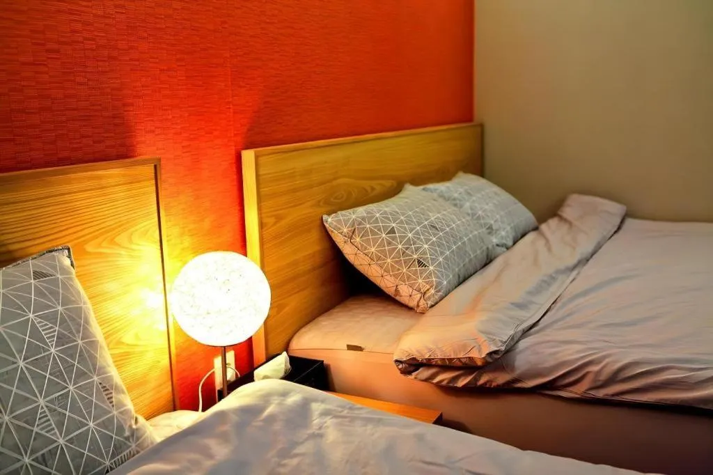 Bed in Jeju Sejong Hotel