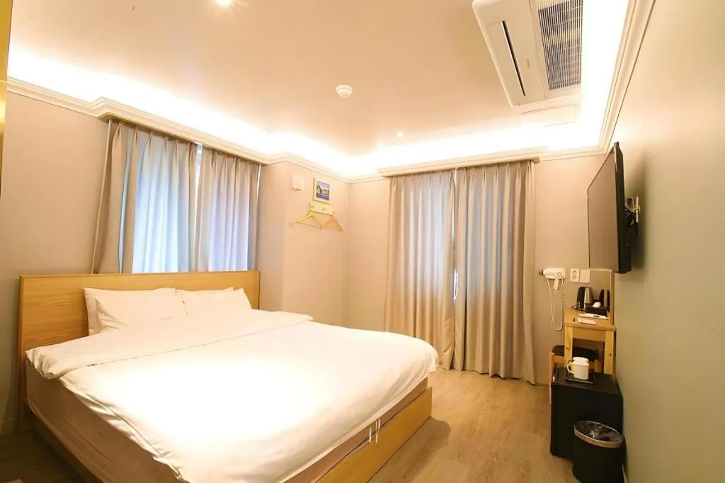 Bed in Jeju Sejong Hotel