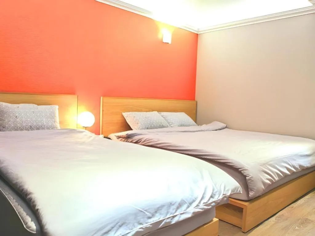 Bed in Jeju Sejong Hotel