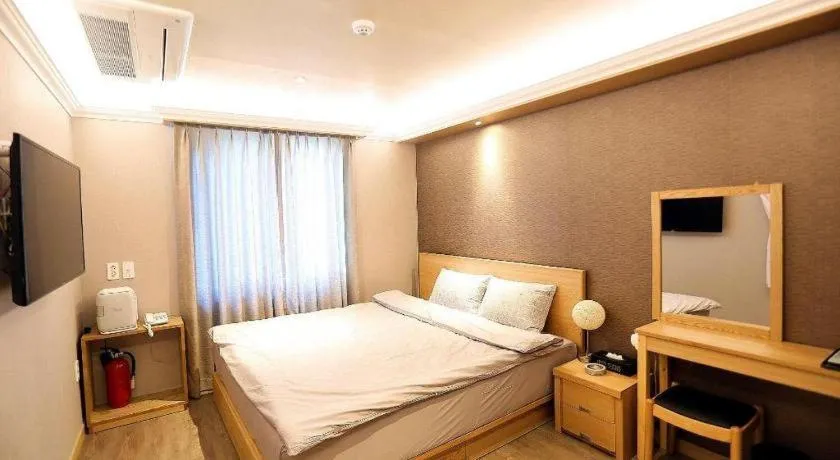 Bed in Jeju Sejong Hotel