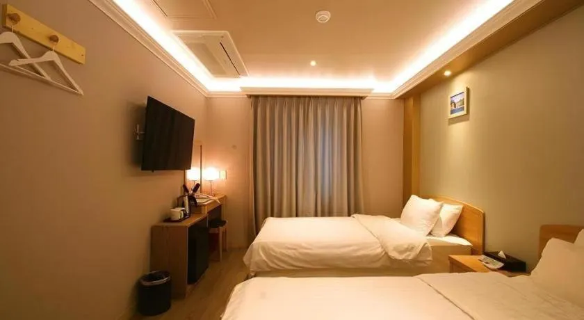 Bed in Jeju Sejong Hotel