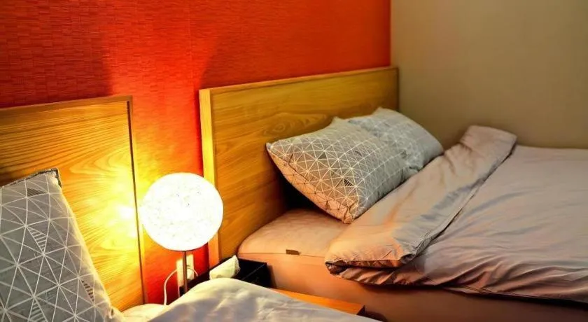 Bed in Jeju Sejong Hotel