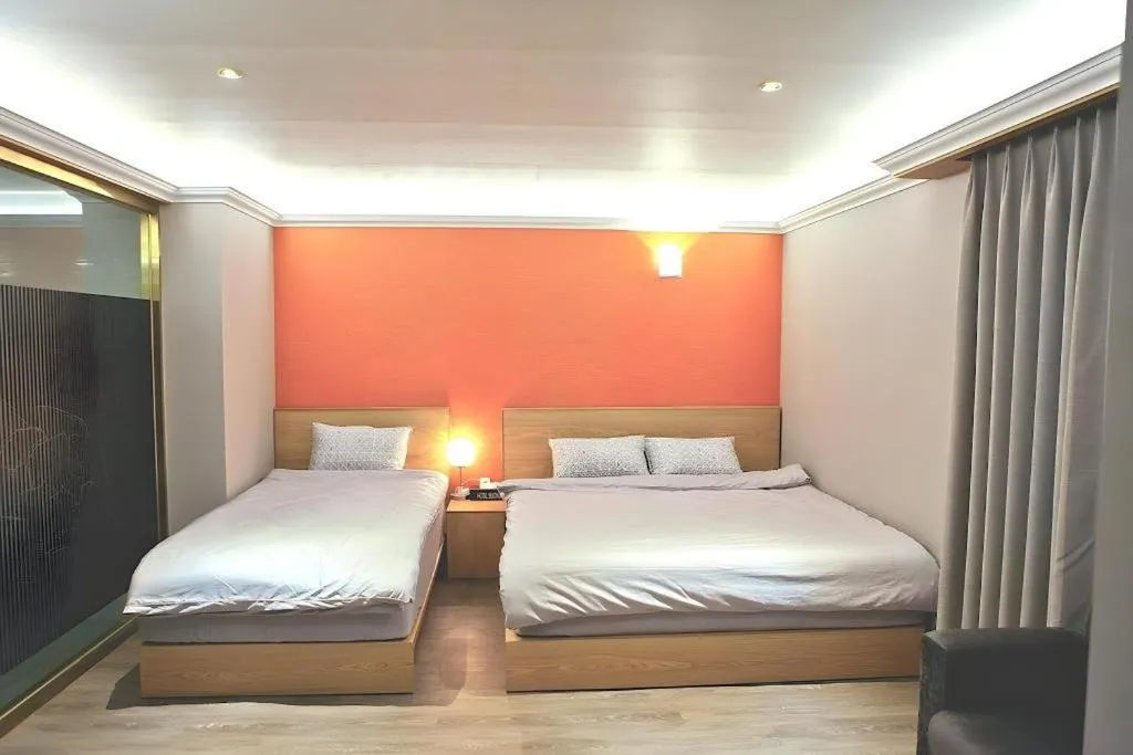 Bed in Jeju Sejong Hotel