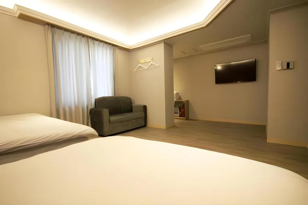 Bed in Jeju Sejong Hotel