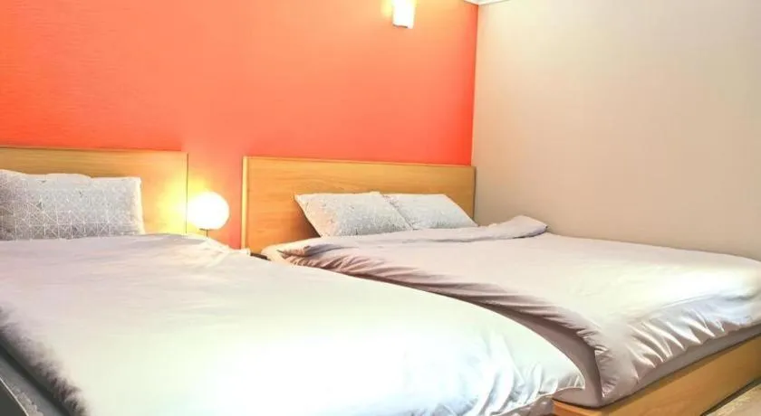 Bed in Jeju Sejong Hotel