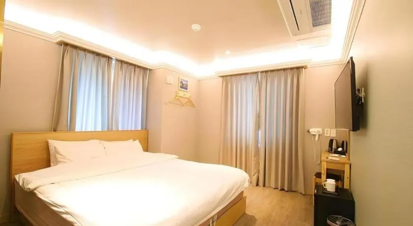 Bed in Jeju Sejong Hotel