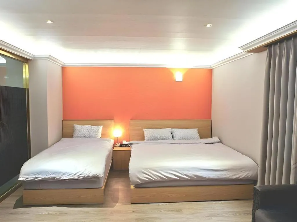 Bed in Jeju Sejong Hotel