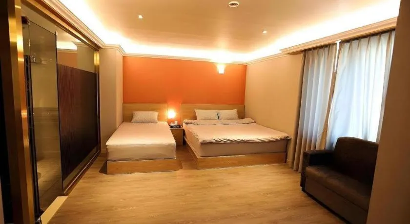 Bed in Jeju Sejong Hotel