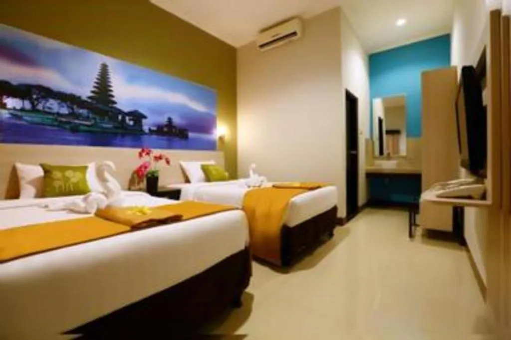 Bed in Asoka City Bali Hotel
