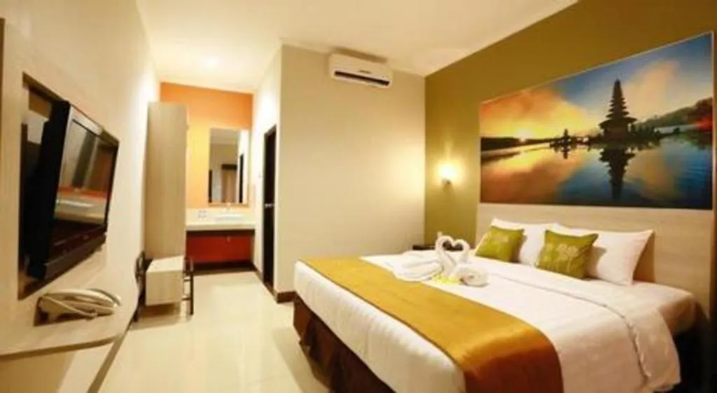 Bed in Asoka City Bali Hotel