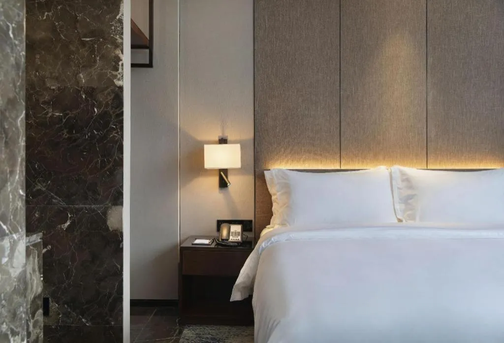 Bed in Zhonghao Boutique Hotel Dalang Business Center