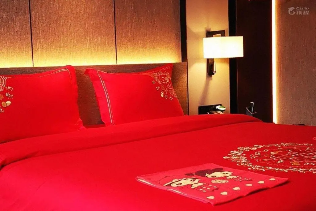 Bed in Zhonghao Boutique Hotel Dalang Business Center