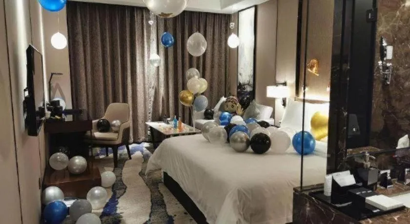 Bed in Zhonghao Boutique Hotel Dalang Business Center