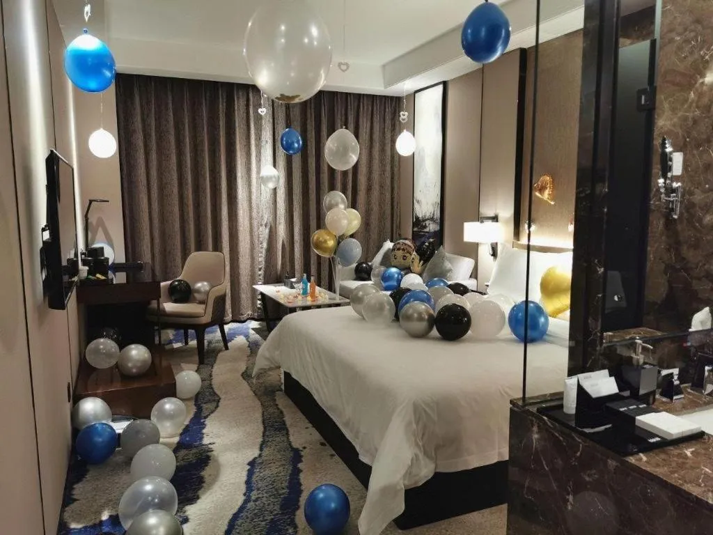 Bed in Zhonghao Boutique Hotel Dalang Business Center