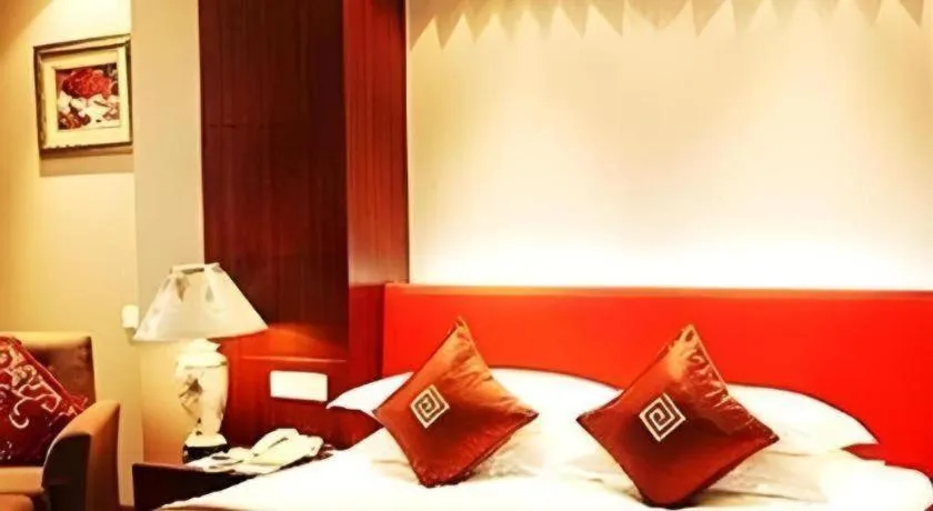 Bed in New Century Pujiang Hotel