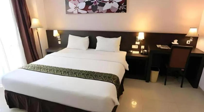 Bed in Grand Hawaii Hotel Pekanbaru