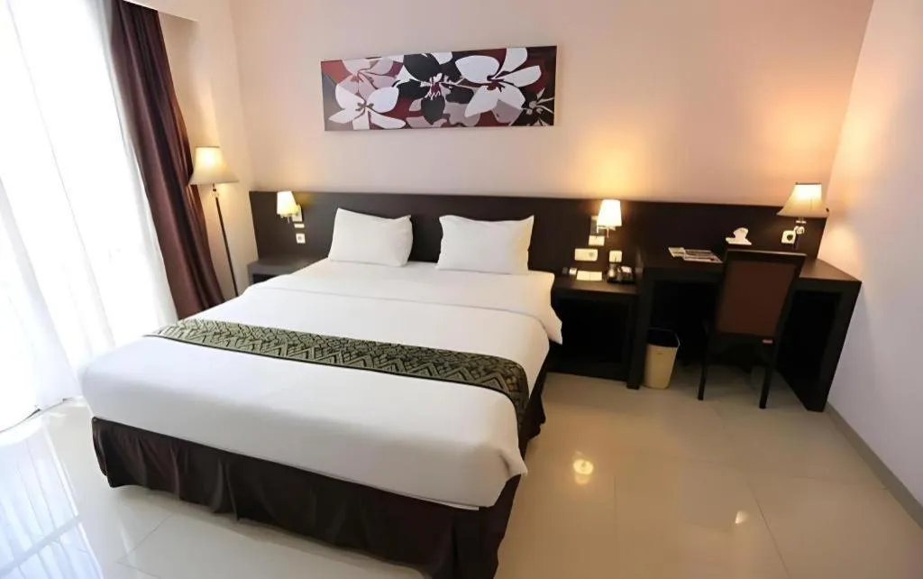 Bed in Grand Hawaii Hotel Pekanbaru
