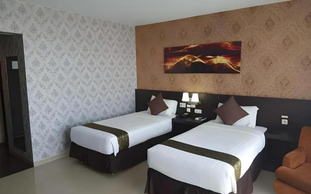 Bed in Grand Hawaii Hotel Pekanbaru