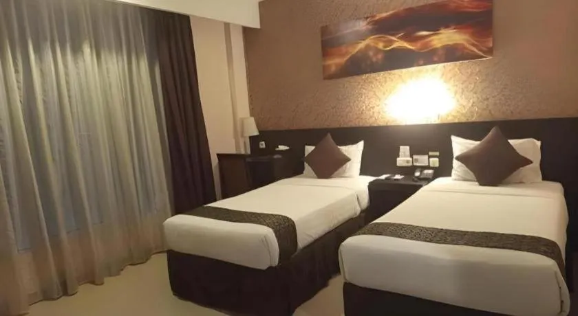 Bed in Grand Hawaii Hotel Pekanbaru