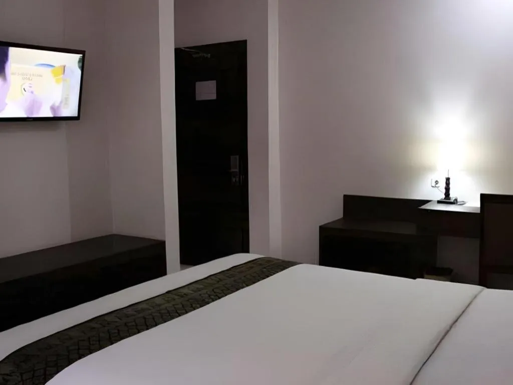 Bed in Grand Hawaii Hotel Pekanbaru