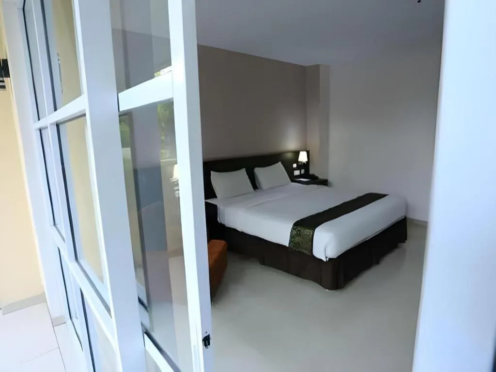 Bed in Grand Hawaii Hotel Pekanbaru