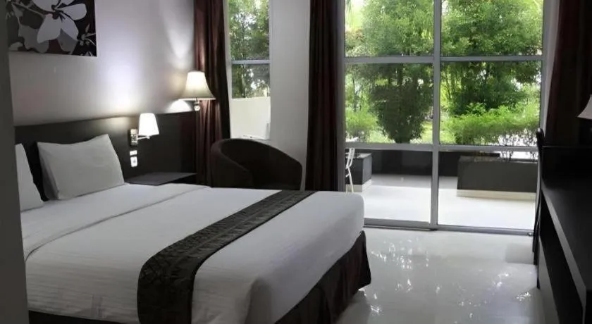 Bed in Grand Hawaii Hotel Pekanbaru