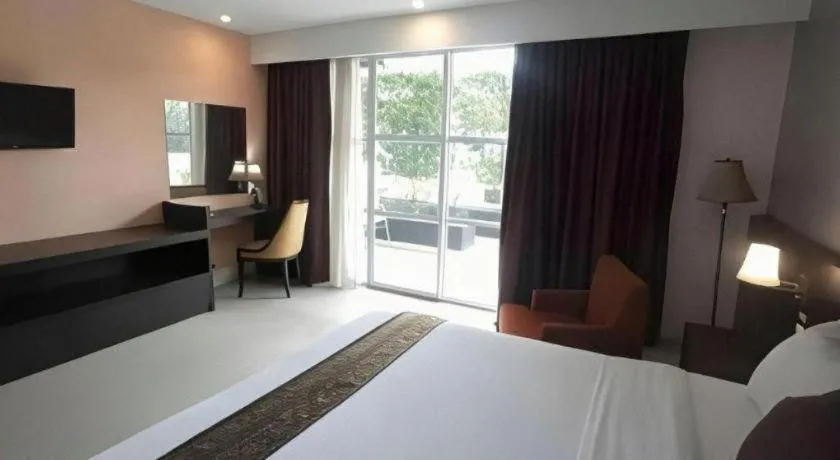 Bed in Grand Hawaii Hotel Pekanbaru