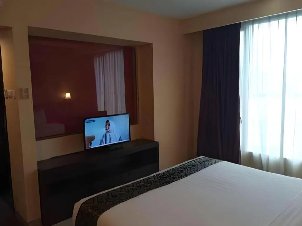 Bed in Grand Hawaii Hotel Pekanbaru