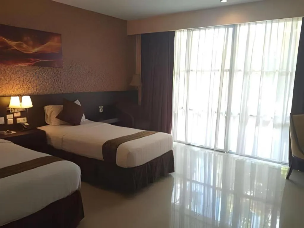 Bed in Grand Hawaii Hotel Pekanbaru