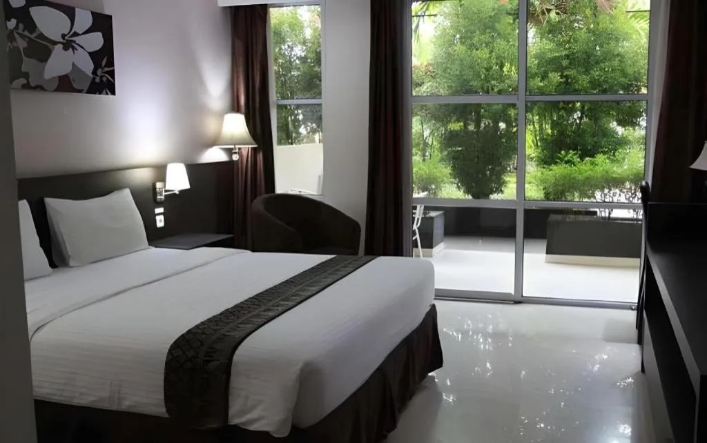 Bed in Grand Hawaii Hotel Pekanbaru