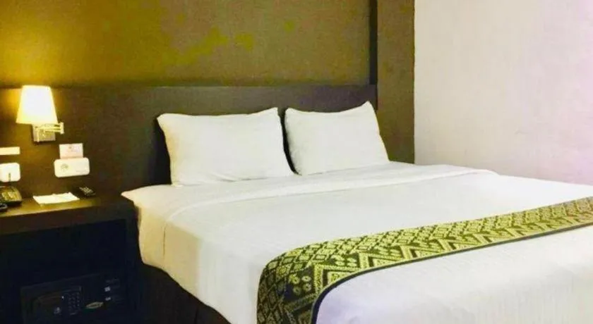 Bed in Grand Hawaii Hotel Pekanbaru