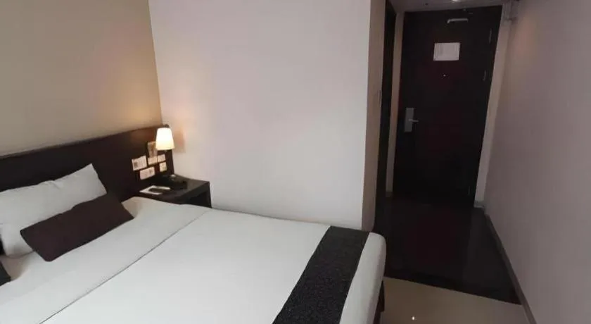 Bed in Grand Hawaii Hotel Pekanbaru