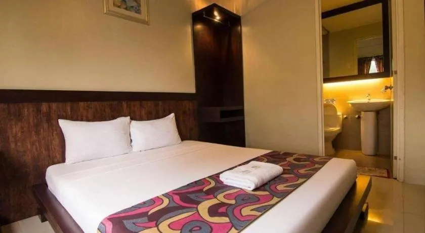 Bed in Driggs Pension House